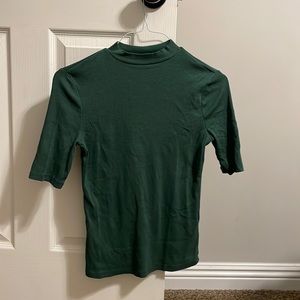 Olive green mid turtle next shirt. Never used, halfway sleeves